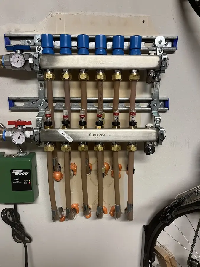 Plumber performing Gas Leak Detection at a residential property in Spring Lake